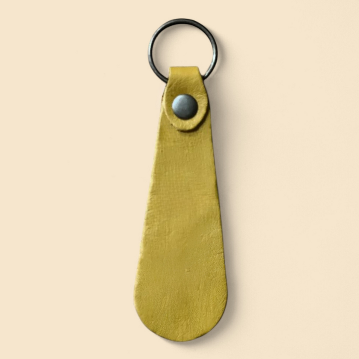 Ngozi Collection mustard leather teardrop keyring