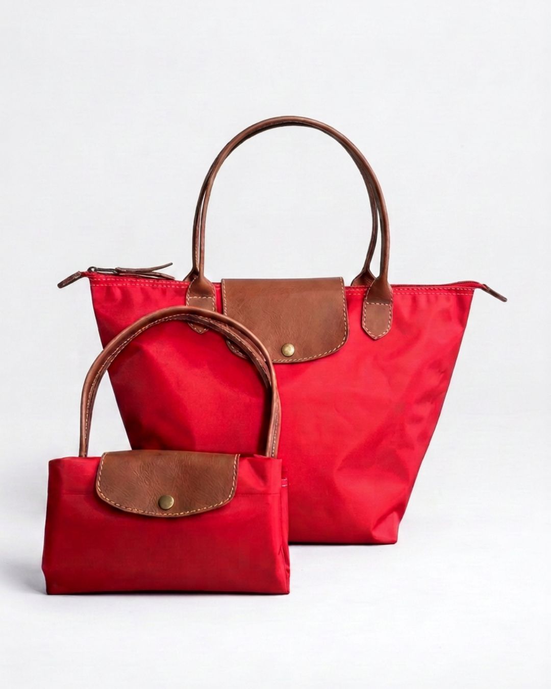 Ngozi Collection red nylon foldable shopper tote shown folded and open