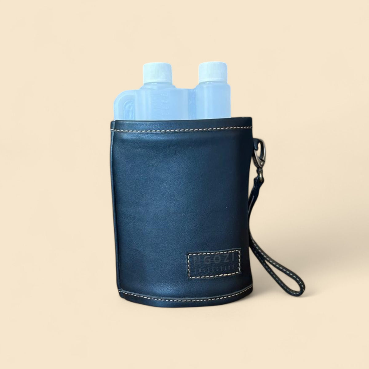 Ngozi Collection black leather tot bottle cover with wrist strap