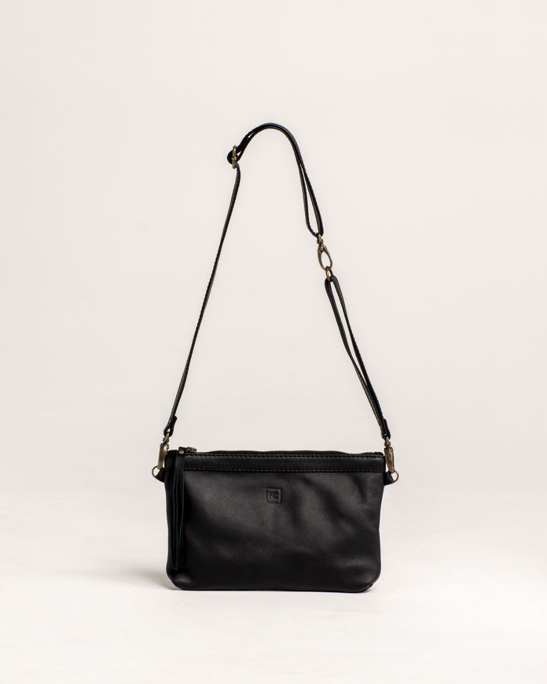 Ngozi Collection black leather hip bag with adjustable strap