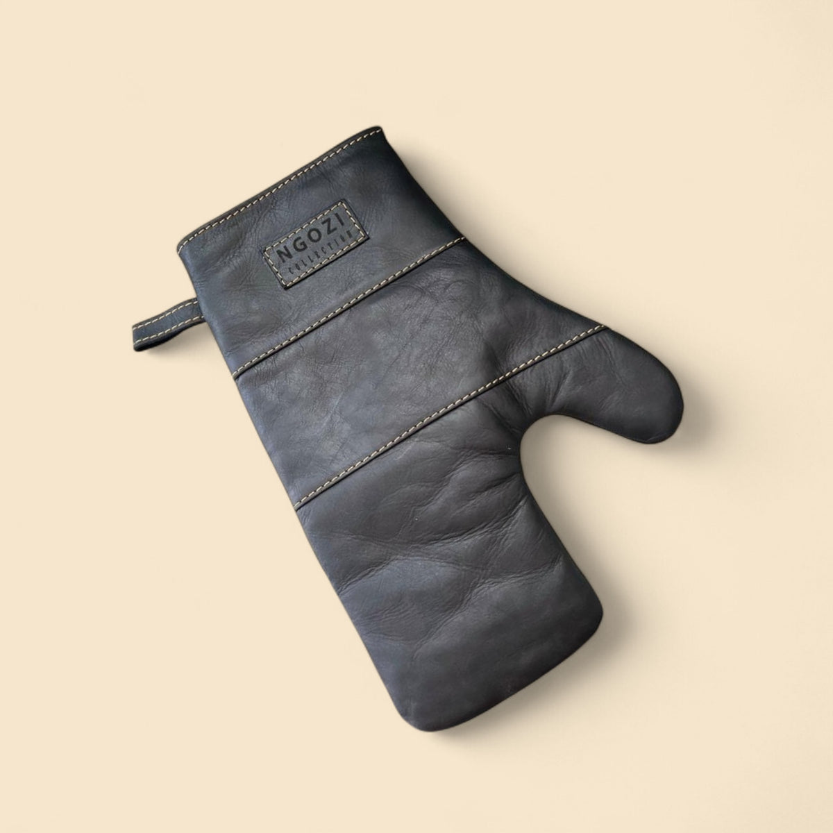 Ngozi Collection black leather oven mitt with hanging loop