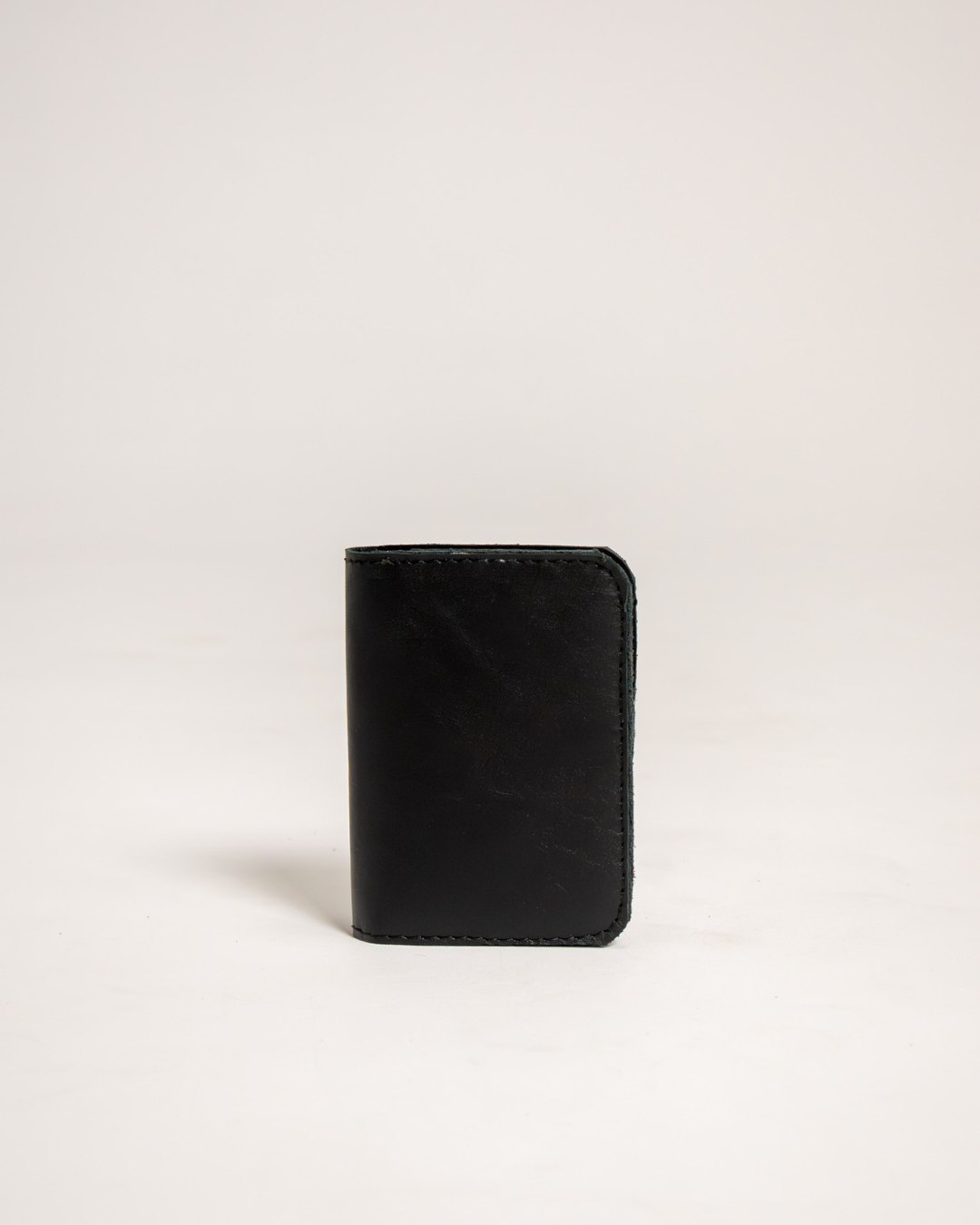 Ngozi Collection black leather passport cover