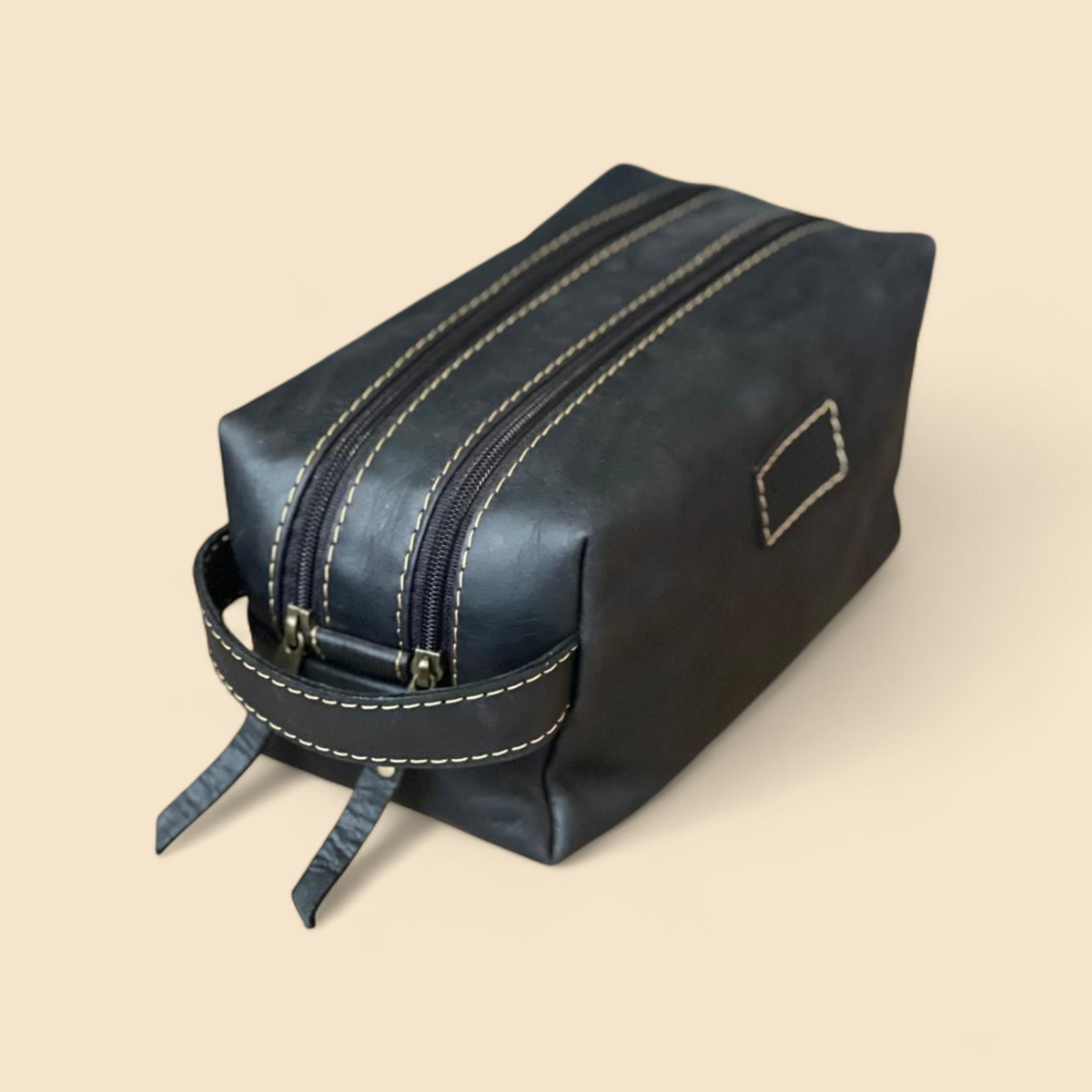 Ngozi Collection black leather toiletry bag