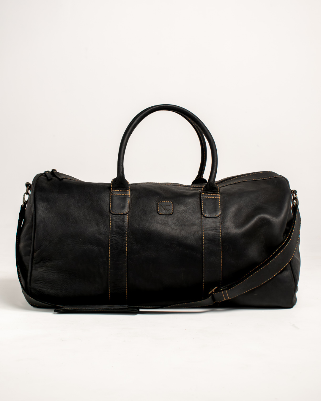 Ngozi Collection black leather weekender bag