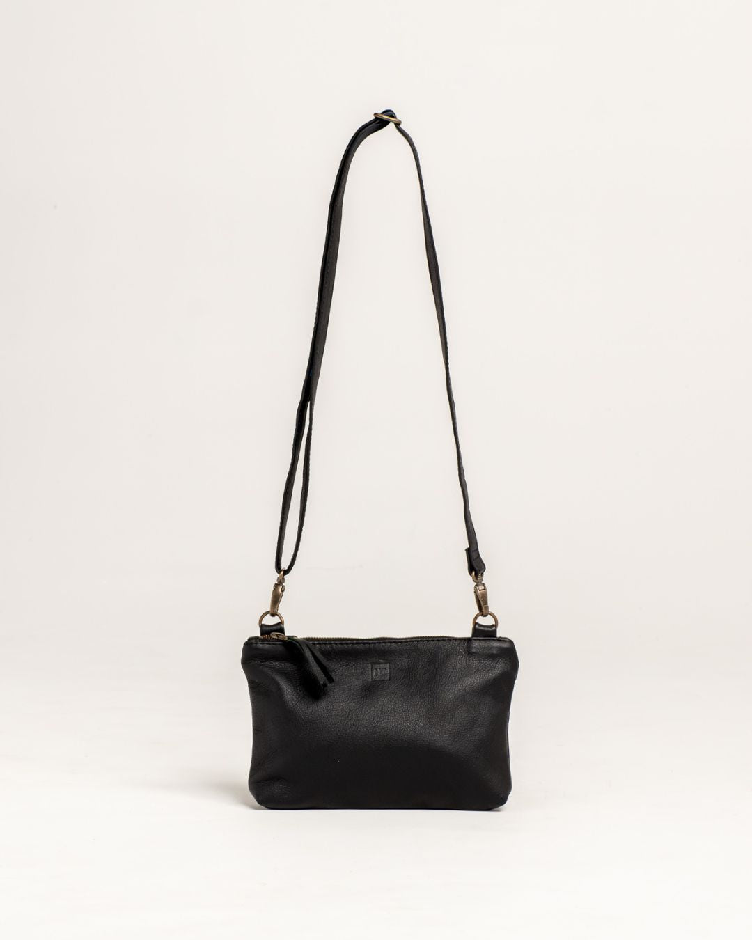 Ngozi Collection black leather sling bag with adjustable strap