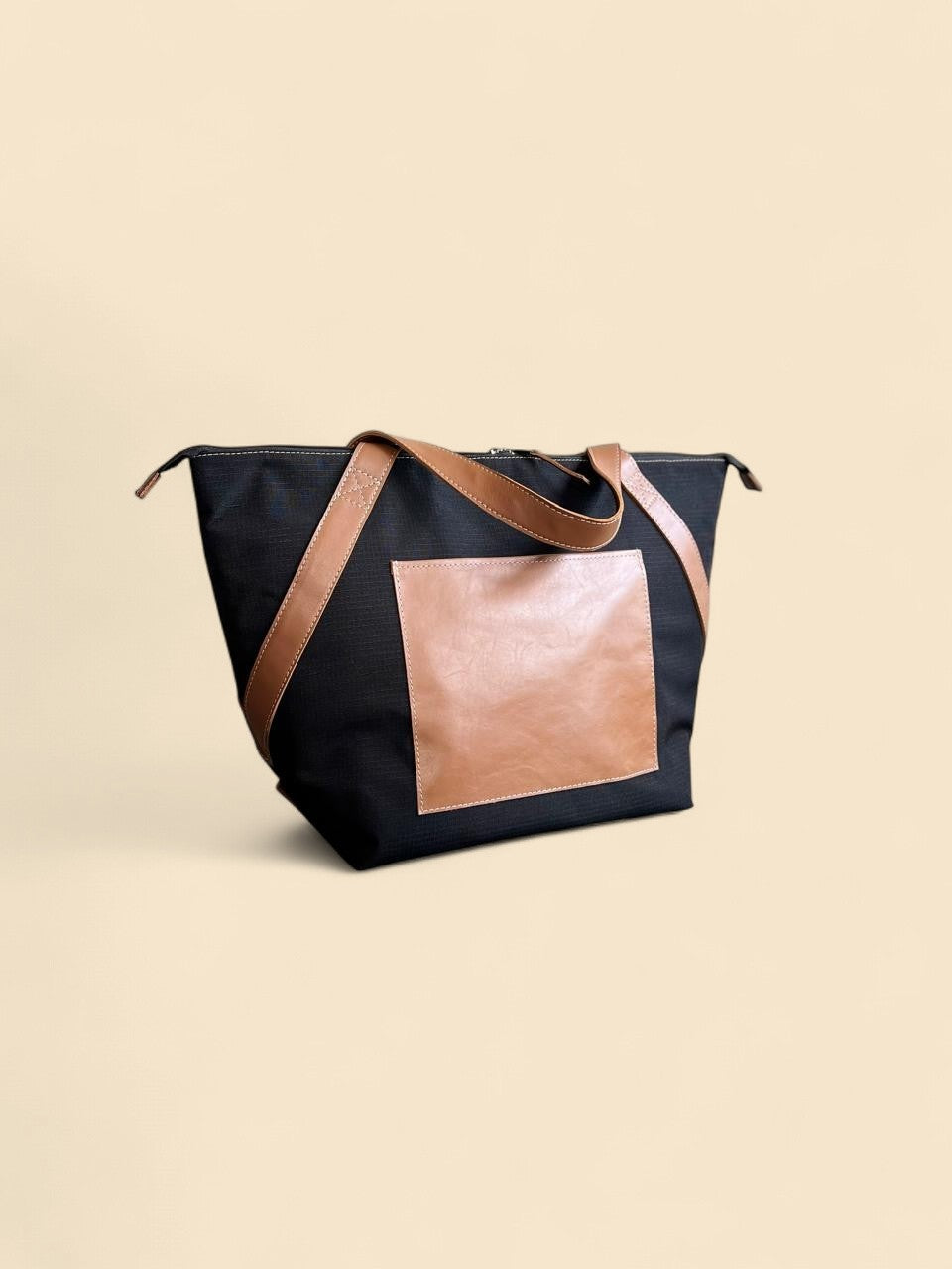 Ngozi Collection black ripstop cooler bag with chocolate leather panel