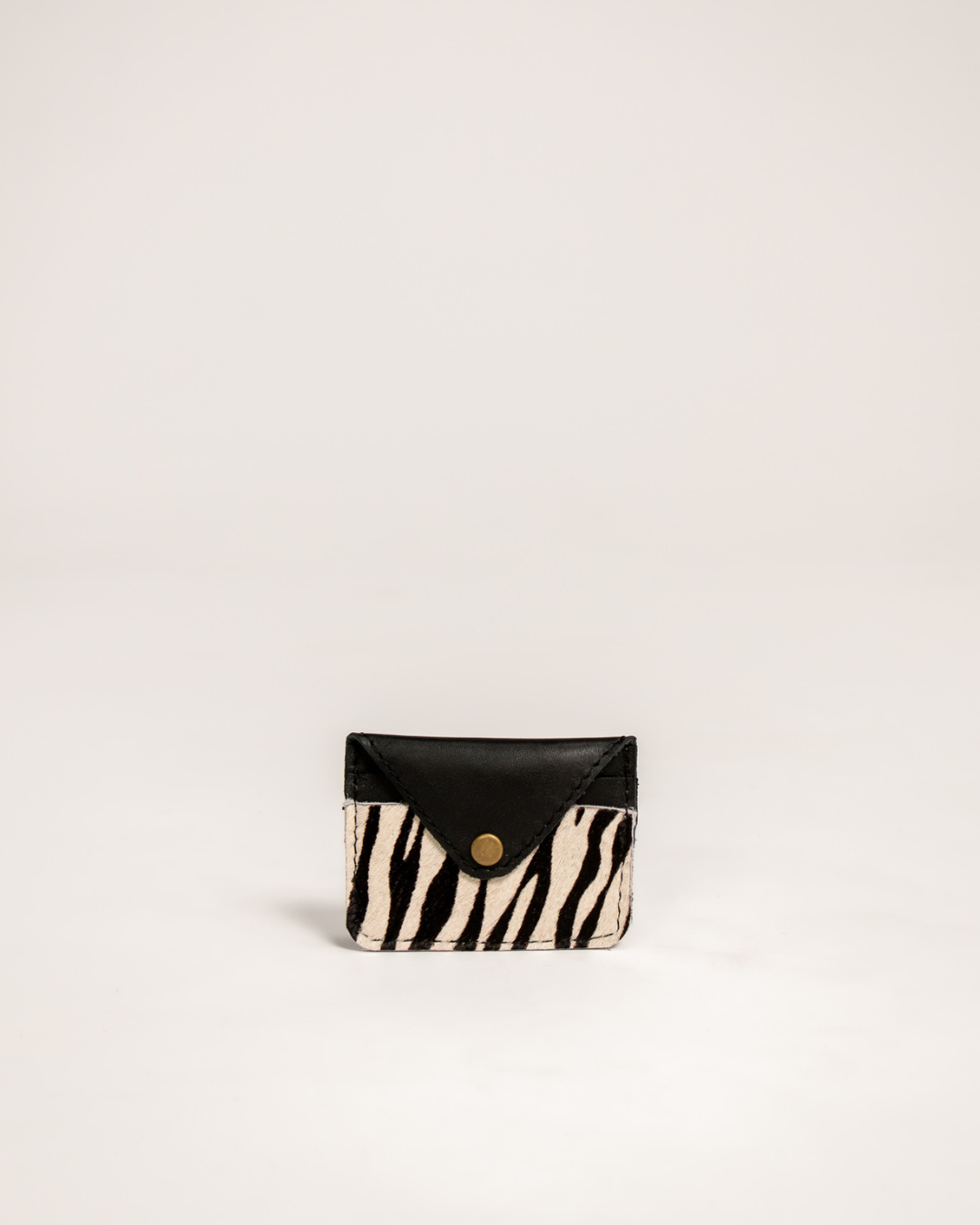 Ngozi Collection zebra print card holder with black leather flap