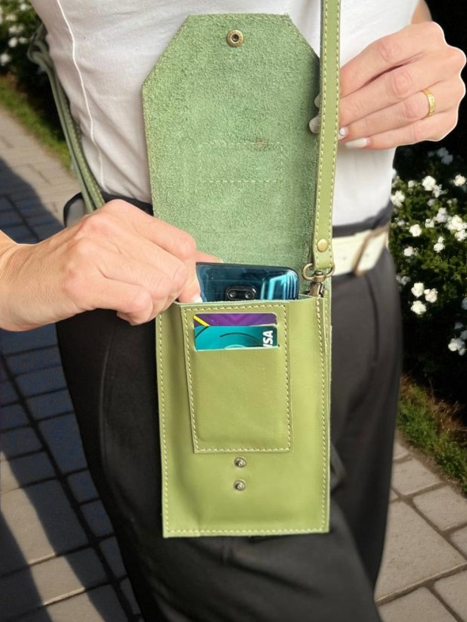 Ngozi Collection sage leather phone sling with card compartment open