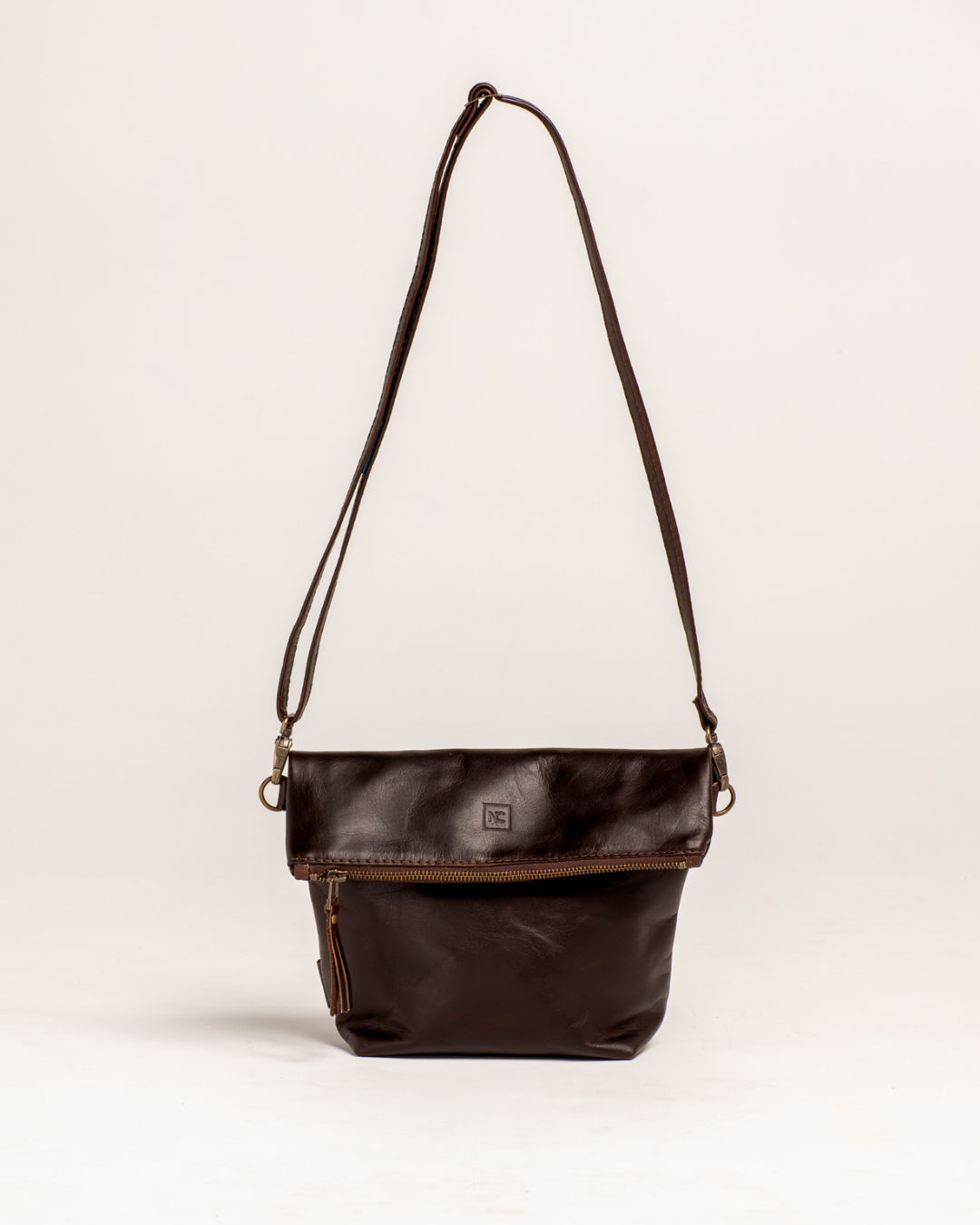 Ngozi Collection chocolate leather small foldover bag