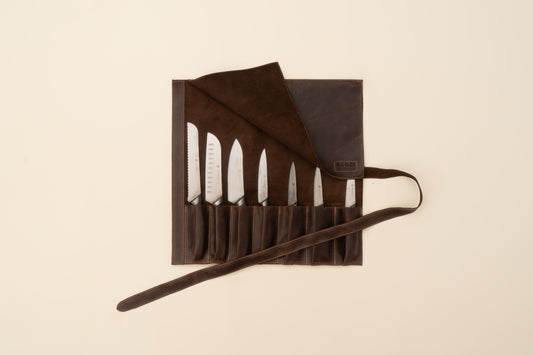 Ngozi Collection chocolate leather knife roll open with knives in slots