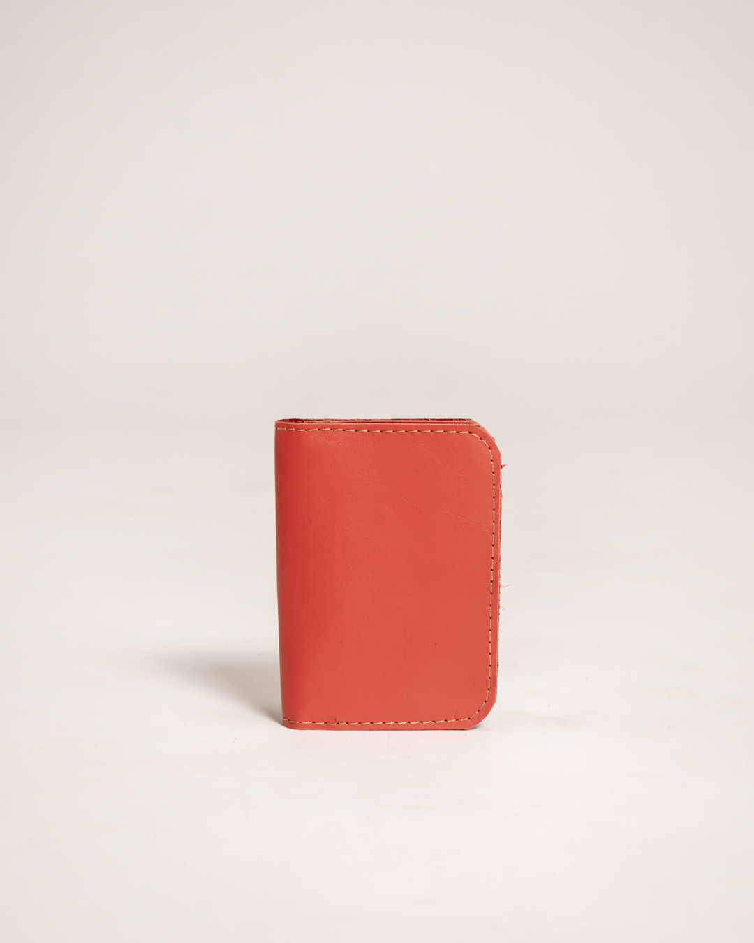Ngozi Collection coral leather passport cover