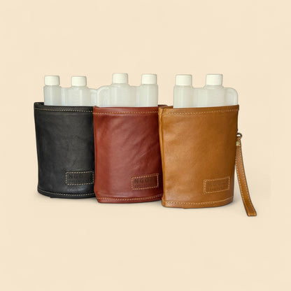 Ngozi Collection leather tot bottle covers in black, rust and tan