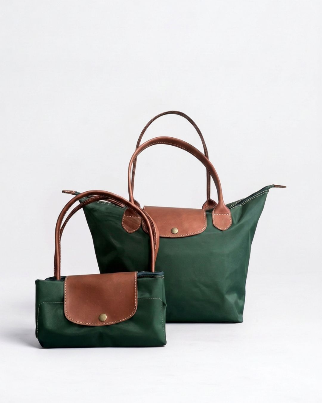 Ngozi Collection green nylon foldable shopper tote shown folded and open