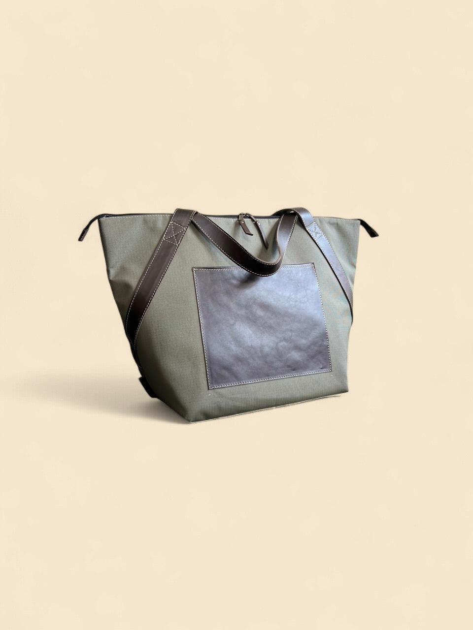 Ngozi Collection green ripstop cooler bag with grey leather panel