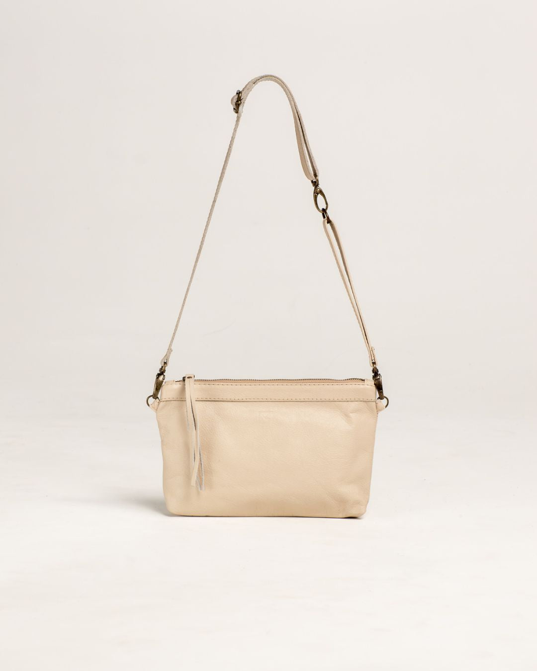 Ngozi Collection latte leather hip bag with adjustable strap