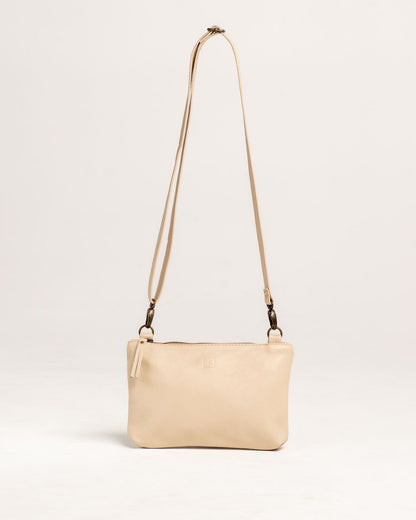 Ngozi Collection latte leather sling bag with adjustable strap