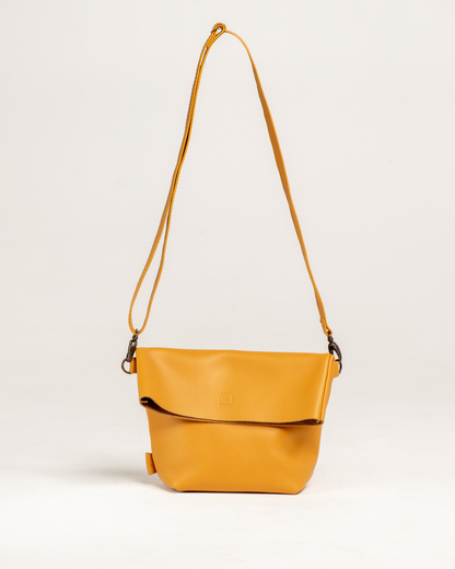Ngozi Collection mustard leather unlined foldover bag