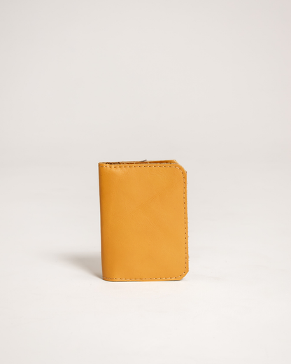 Ngozi Collection mustard leather passport cover
