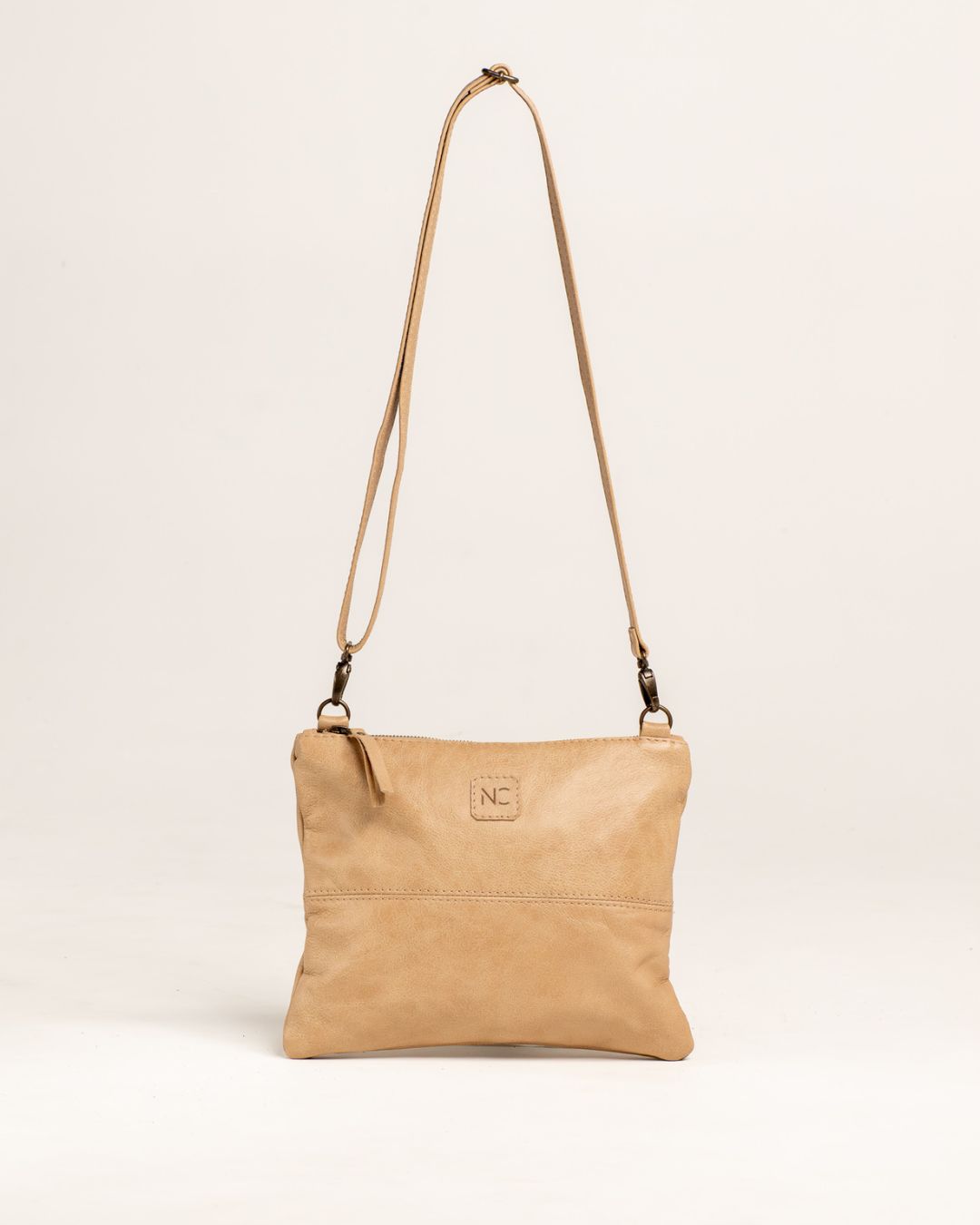 Ngozi Collection oat leather crossbody bag with adjustable strap