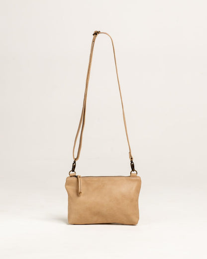 Ngozi Collection oat leather sling bag with adjustable strap