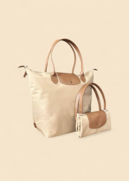 Ngozi Collection oat nylon foldable shopper tote shown folded and open
