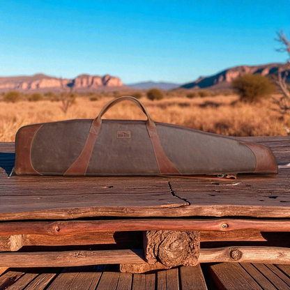 Ngozi Collection two-tone leather rifle bag on a wooden bench outdoors