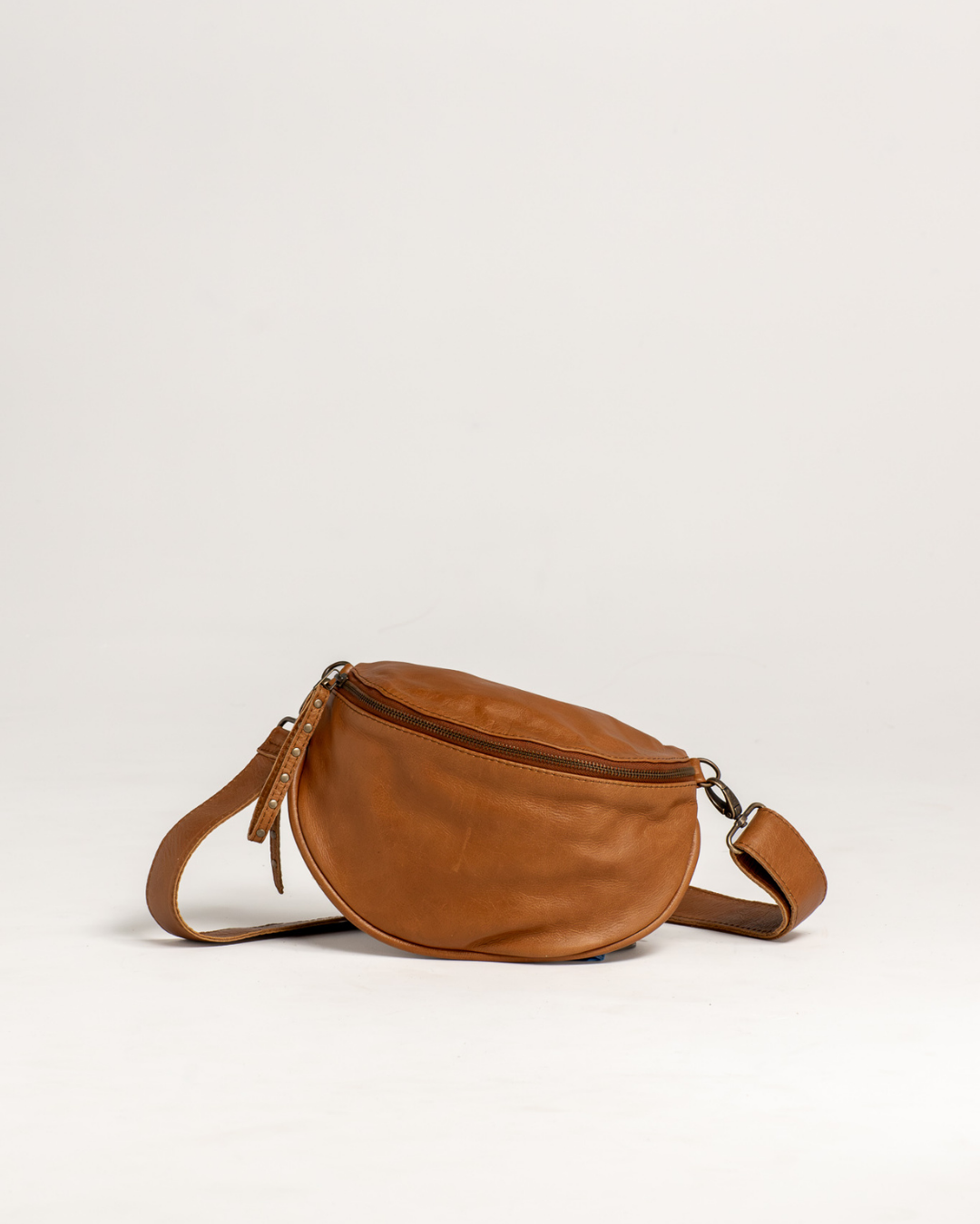 Ngozi Collection tan leather bum bag