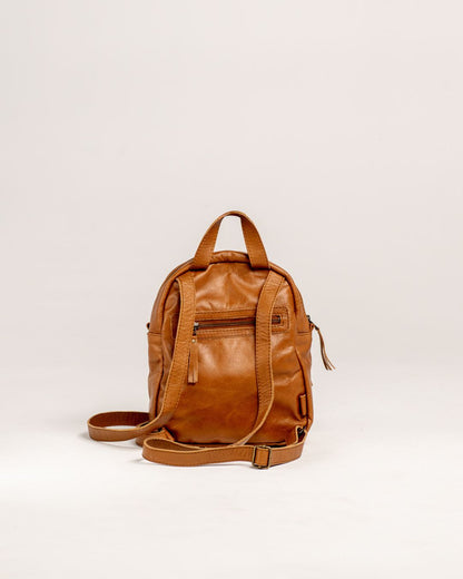 Ngozi Collection tan leather small backpack showing adjustable straps and back zip pocket
