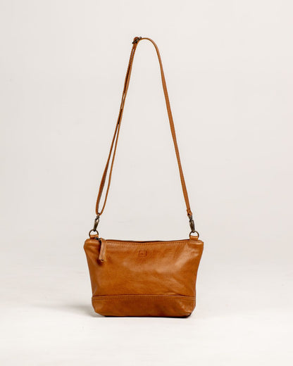 Ngozi Collection tan leather sling bag with adjustable strap