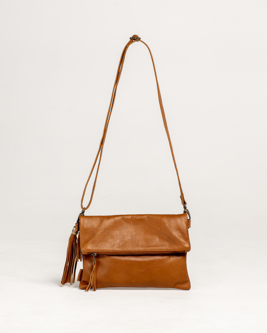 Ngozi Collection tan leather clutch and sling bag