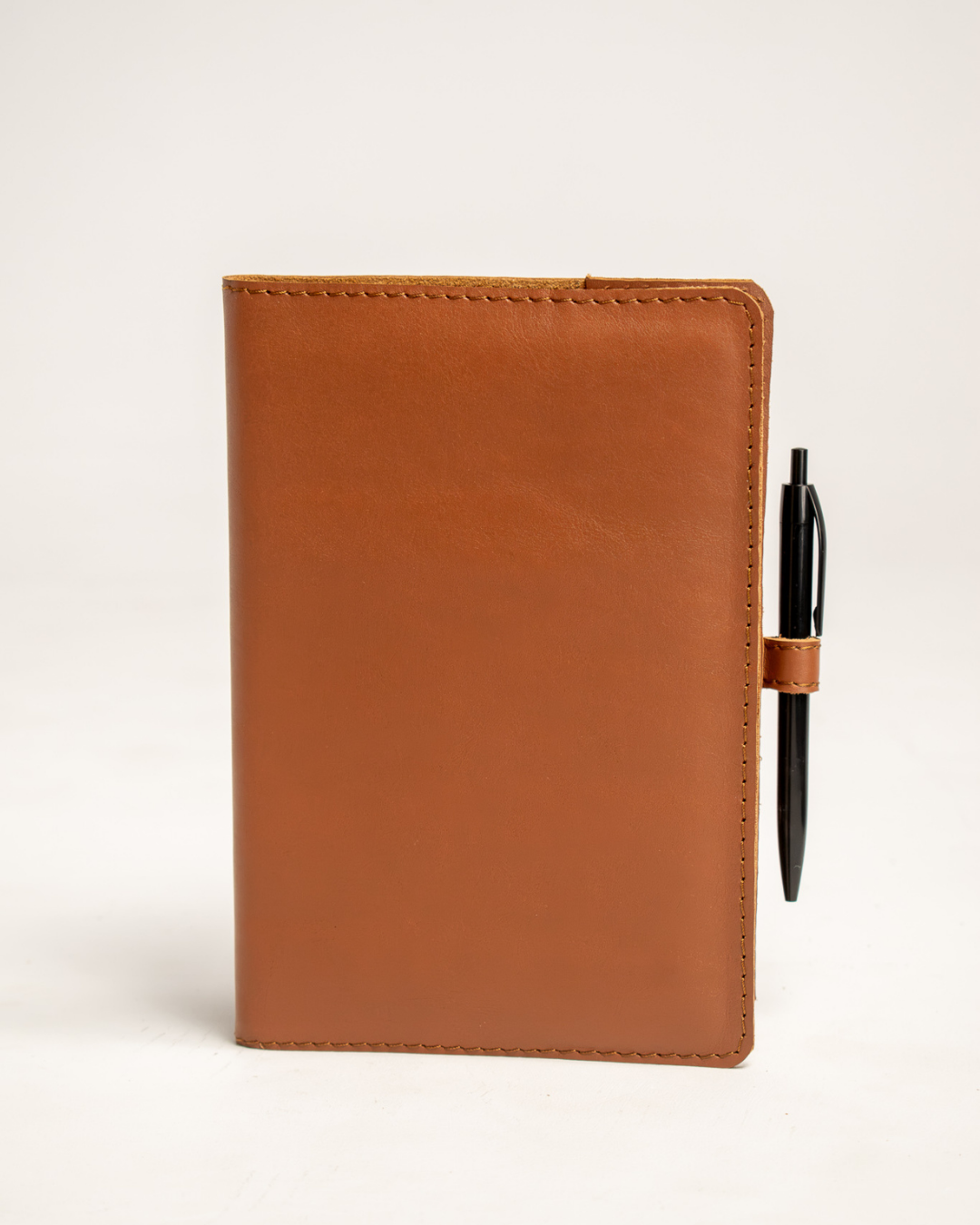 Ngozi Collection tan leather journal with pen