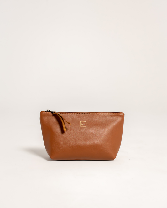 Ngozi Collection tan leather makeup bag with zipper pull