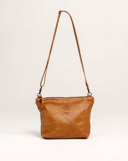 Ngozi Collection tan leather sling bag