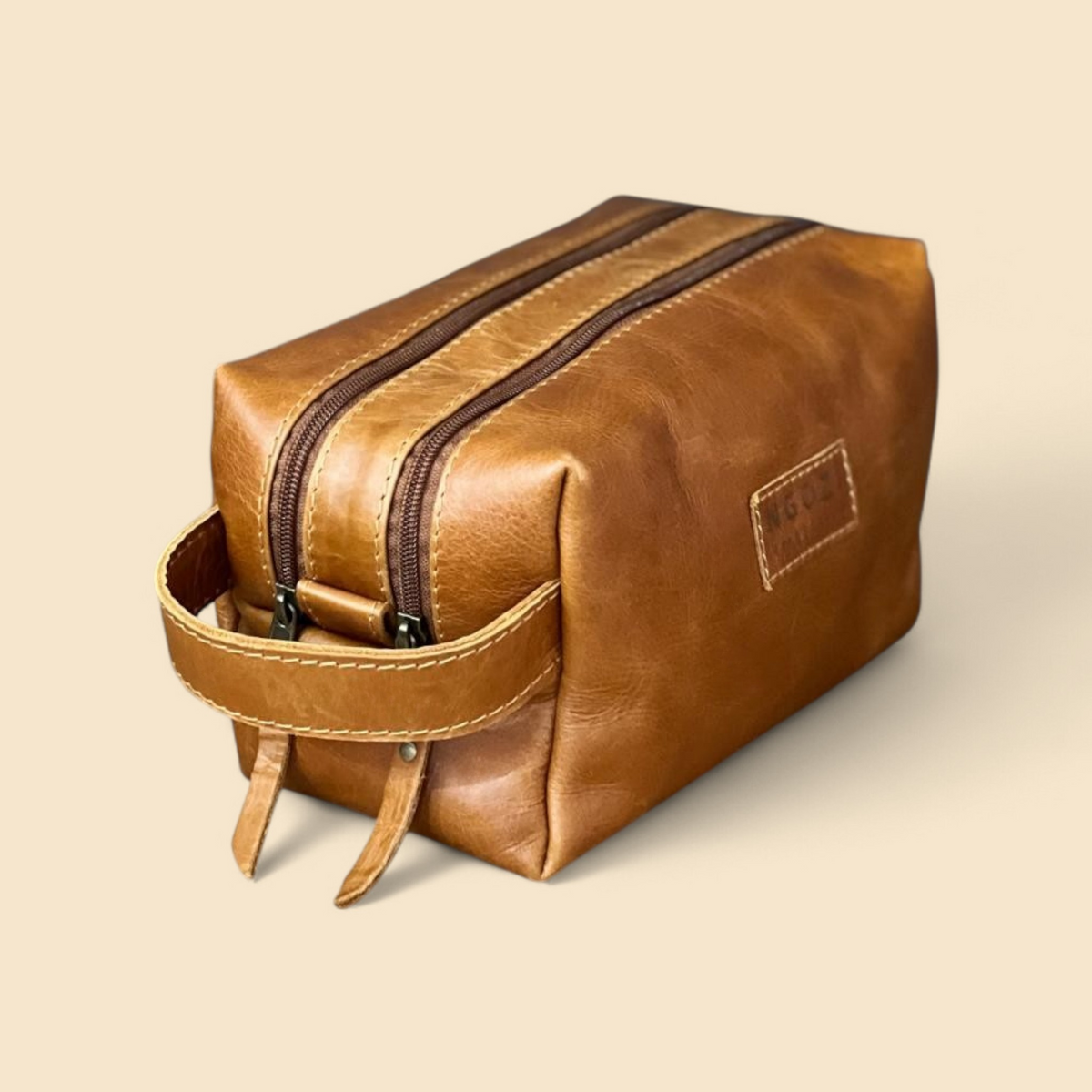 Ngozi Collection tan leather toiletry bag