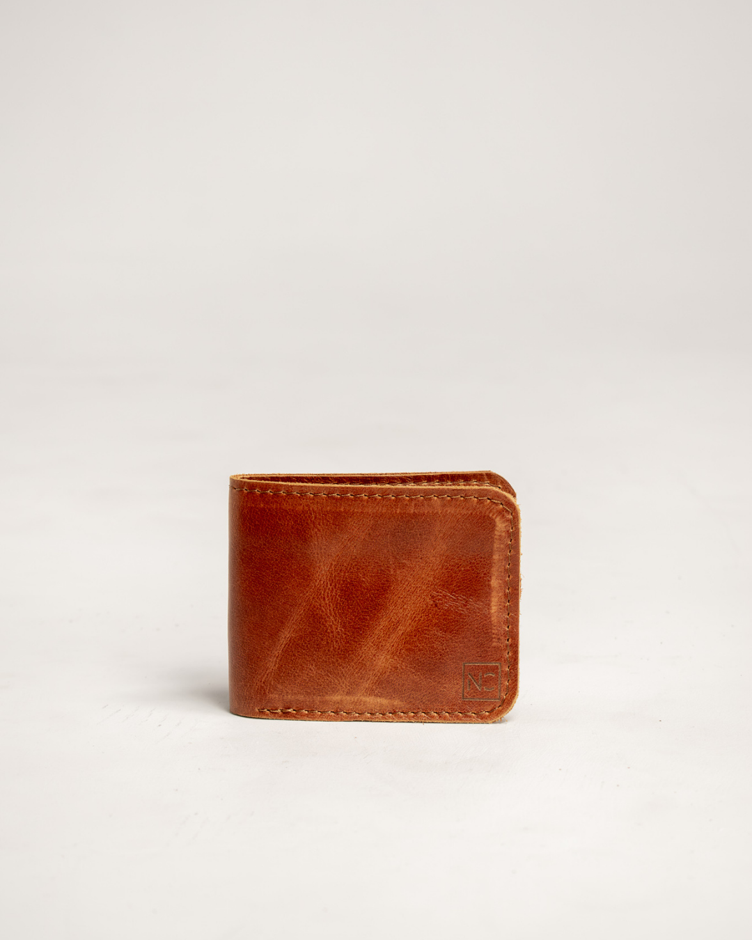 Ngozi Collection tan leather bifold wallet card slots