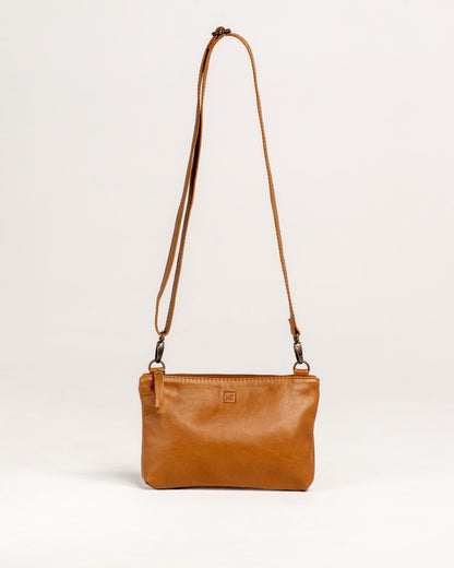 Ngozi Collection tan leather sling bag with adjustable strap