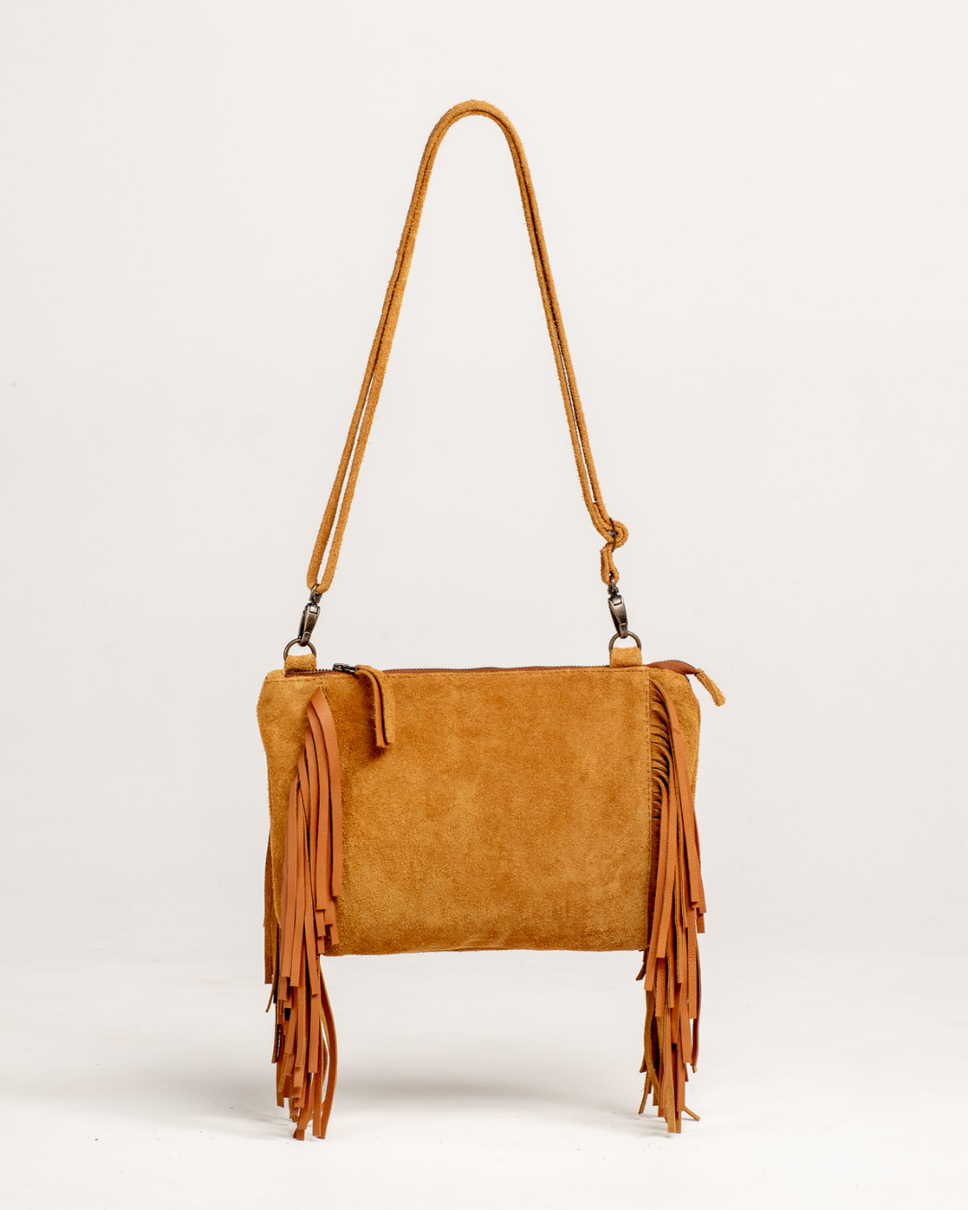 Ngozi Collection tan suede fringe sling bag