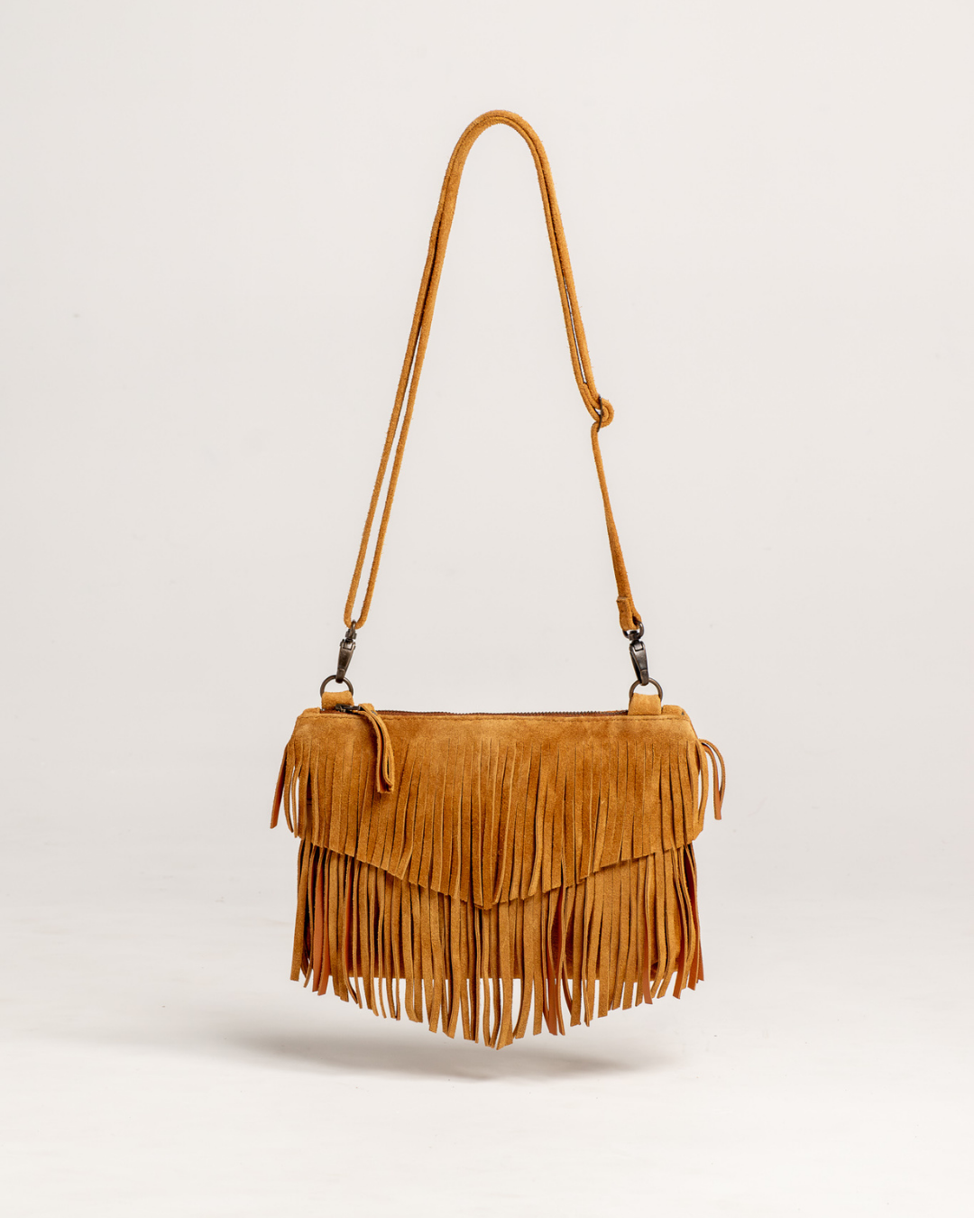 Ngozi Collection tan suede fringe Tahiti sling bag